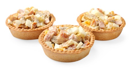 Photo of Tartlets with delicious filling isolated on white