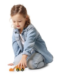 Photo of Little girl playing with toy car on white background