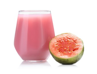 Photo of Tasty guava juice in glass and fresh fruit isolated on white