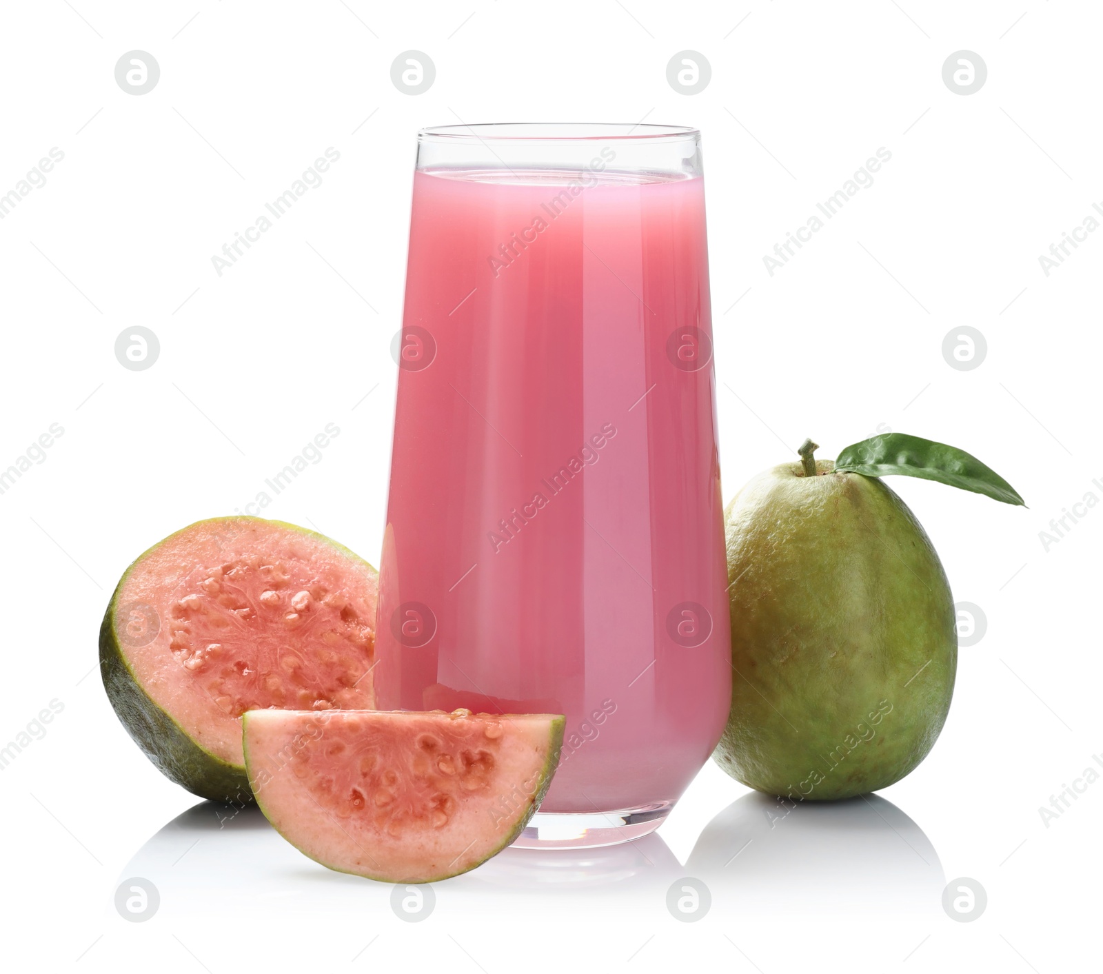 Photo of Tasty guava juice in glass and fresh fruits isolated on white