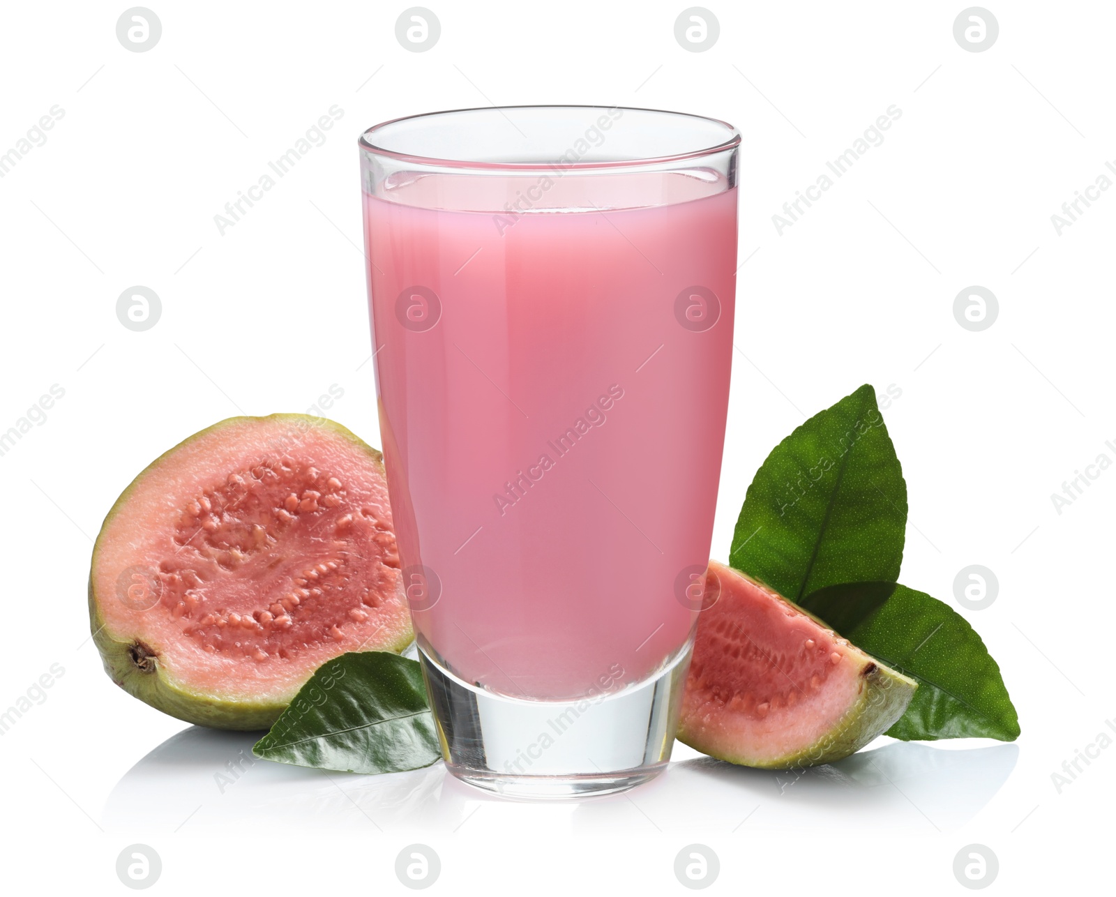 Photo of Tasty guava juice in glass and fresh fruits isolated on white