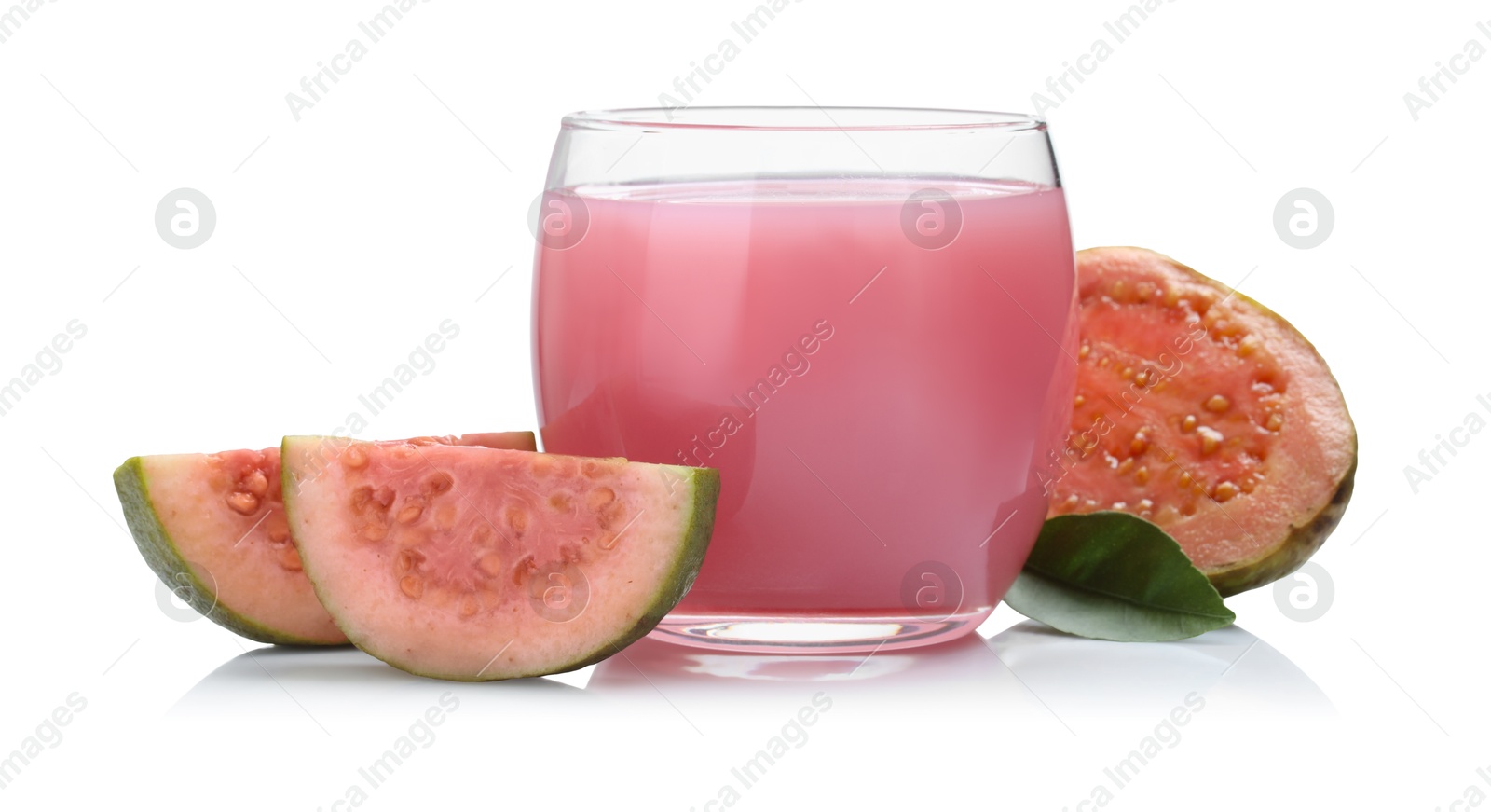 Photo of Tasty guava juice in glass and fresh fruits isolated on white