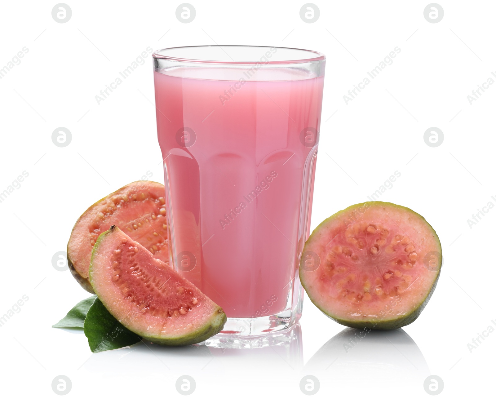 Photo of Tasty guava juice in glass and fresh fruits isolated on white