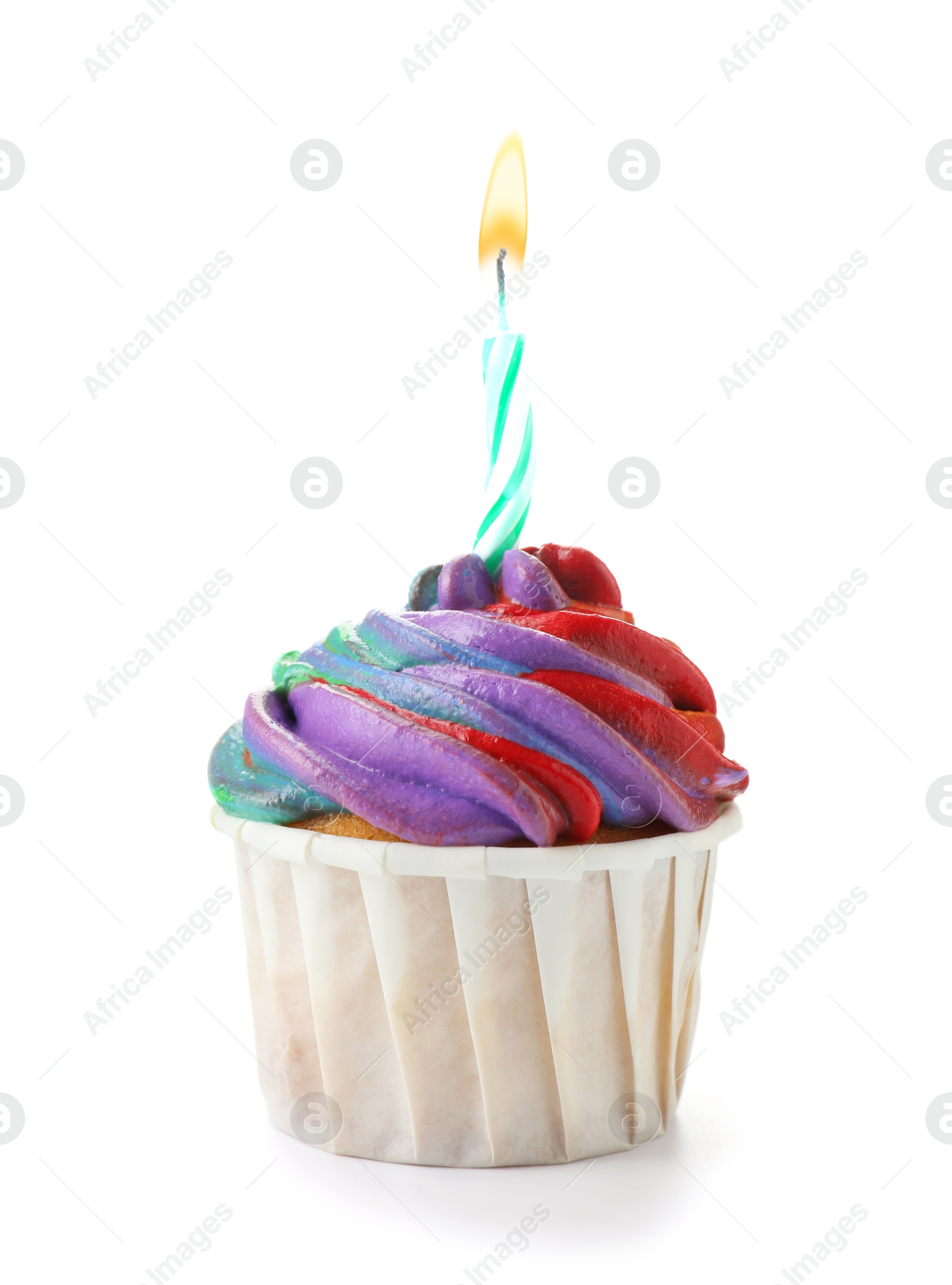 Photo of Delicious cupcake with colorful cream and candle isolated on white