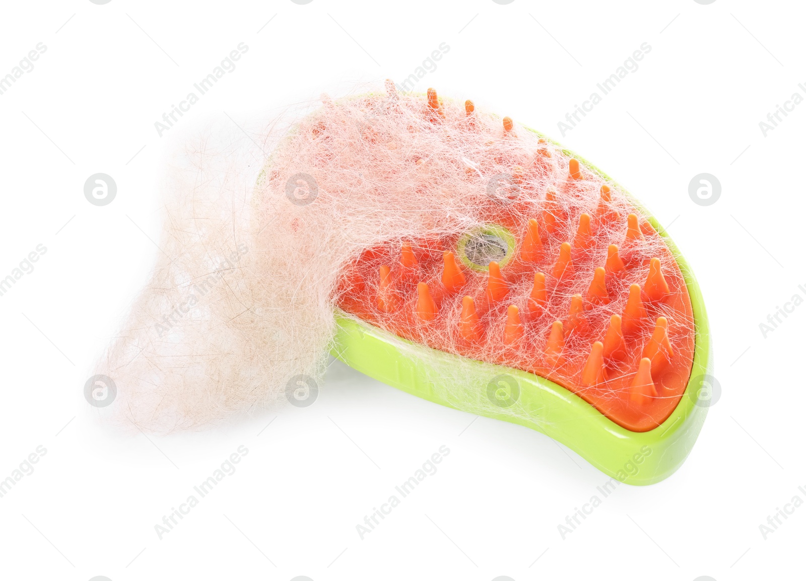 Photo of Grooming brush and pile of pet's hair isolated on white