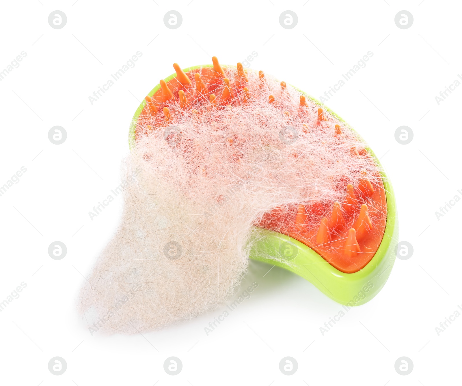 Photo of Grooming brush and pile of pet's hair isolated on white