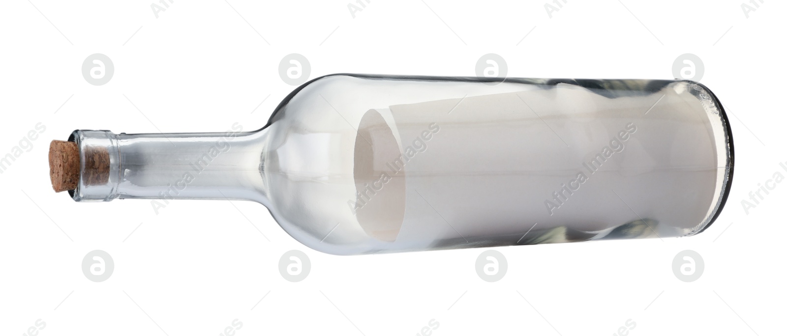 Photo of Rolled letter in corked glass bottle isolated on white