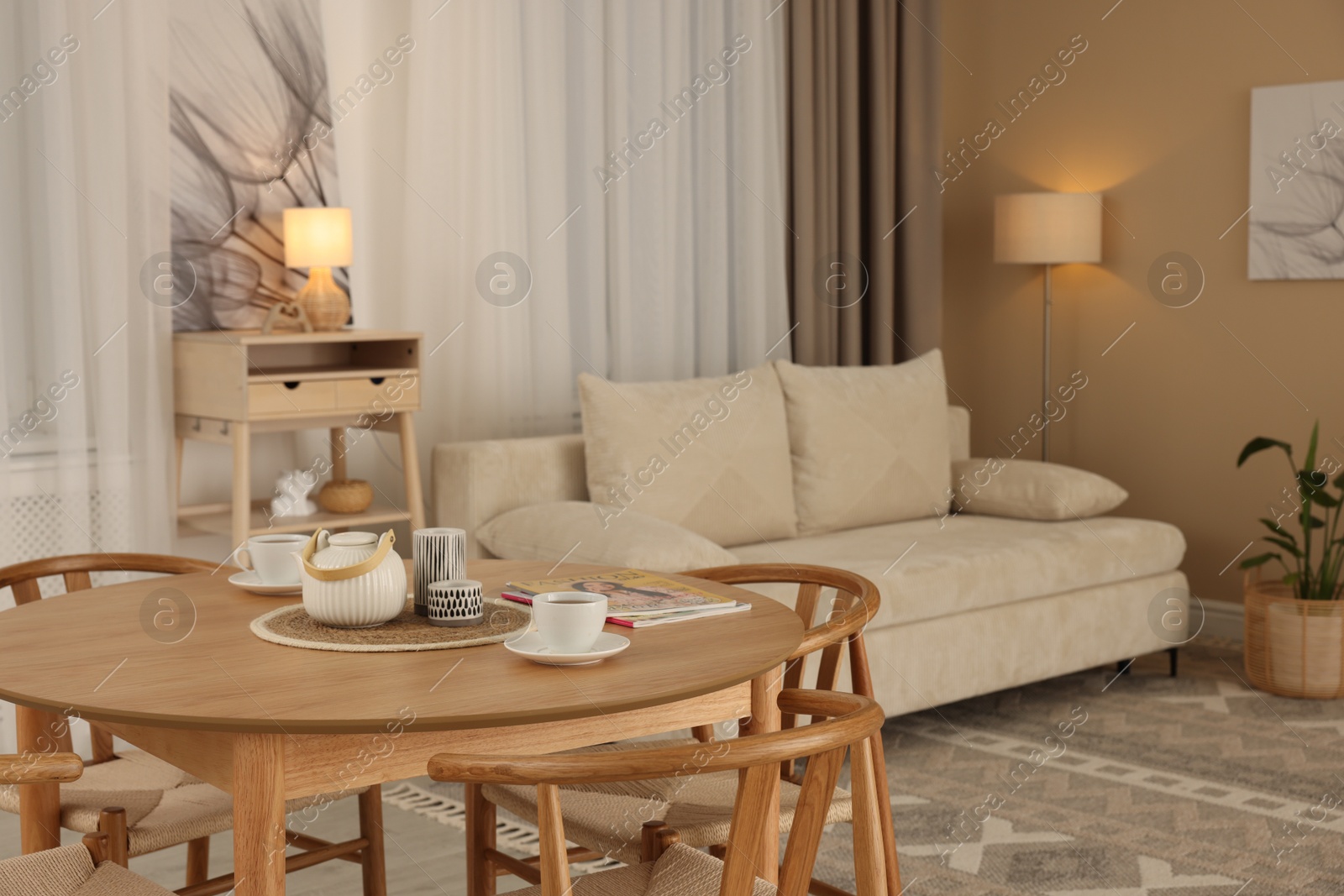 Photo of Beautiful furniture and decor in cozy living room. Interior design