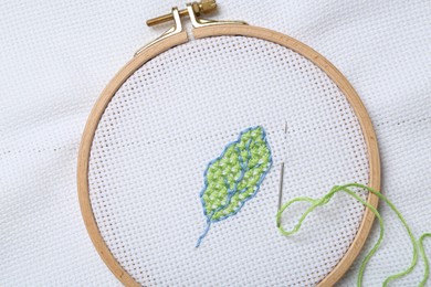 Canvas with embroidery in hoop, top view