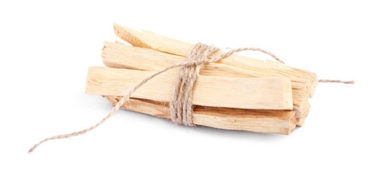 Photo of Bunch of palo santo sticks on white background