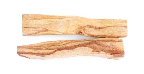 Photo of Palo santo sticks on white background, top view