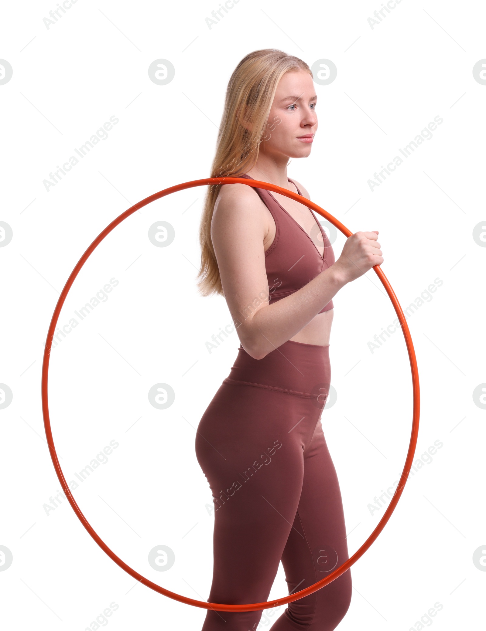 Photo of Beautiful young woman with hula hoop isolated on white