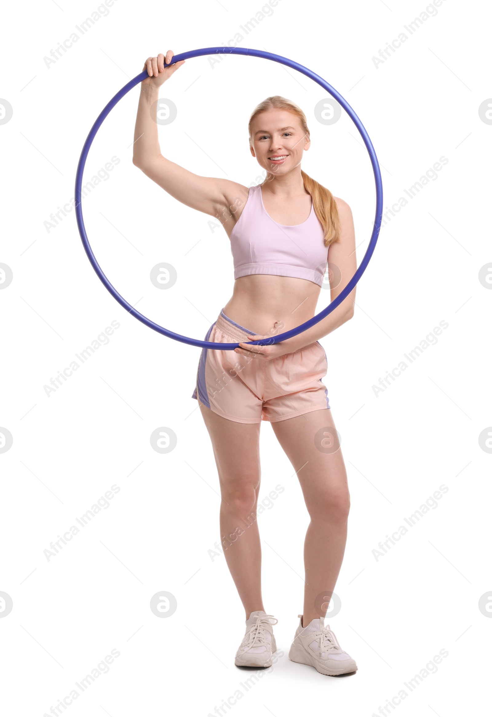 Photo of Beautiful young woman with hula hoop isolated on white