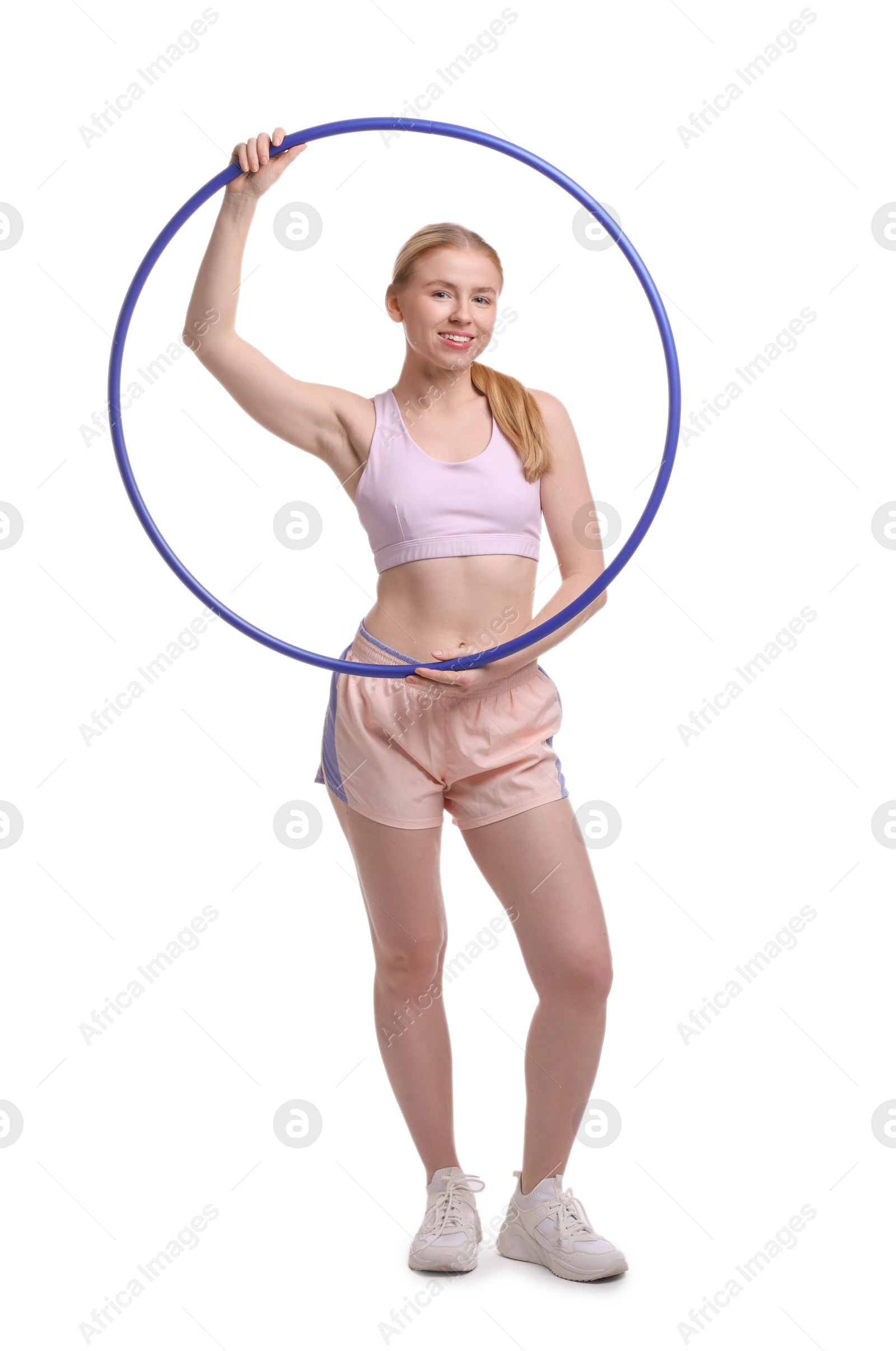 Photo of Beautiful young woman with hula hoop isolated on white