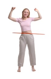 Photo of Beautiful young woman exercising with hula hoop on white background