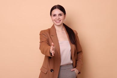 Photo of Portrait of banker in jacket on beige background