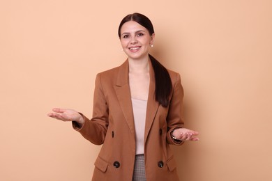 Photo of Portrait of banker in jacket on beige background