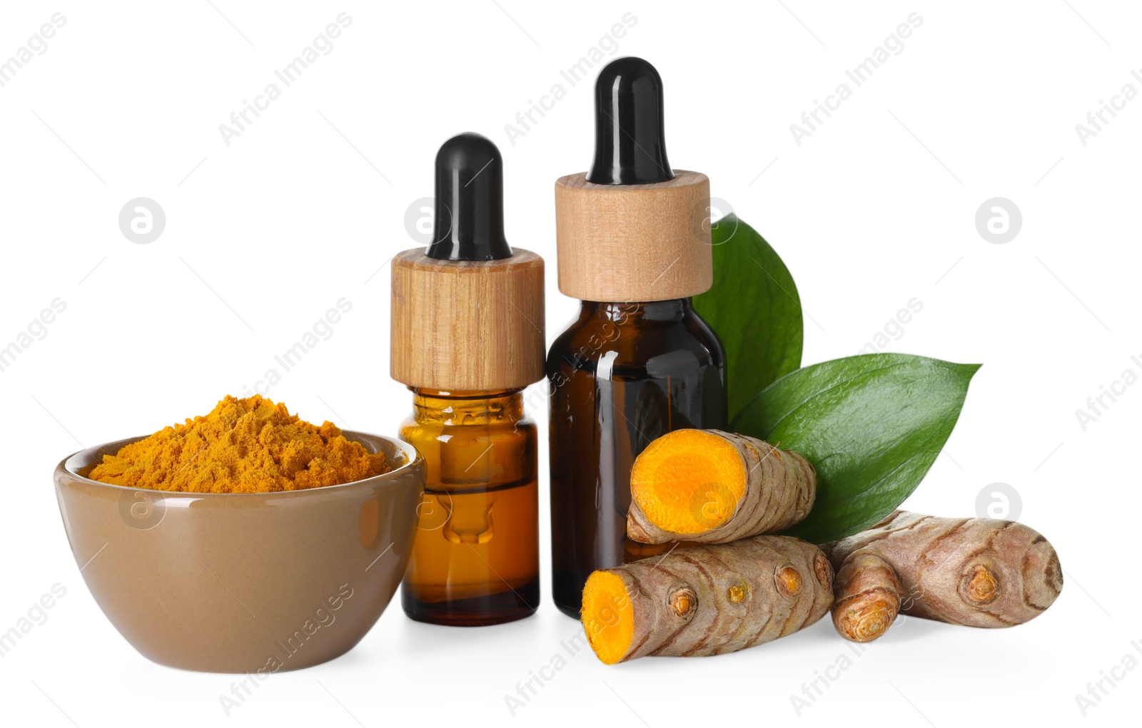 Photo of Bottles of turmeric essential oil, powder, raw roots and leaves isolated on white