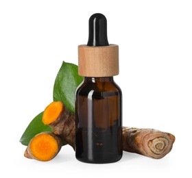 Photo of Bottle of turmeric essential oil, raw roots and leaves isolated on white