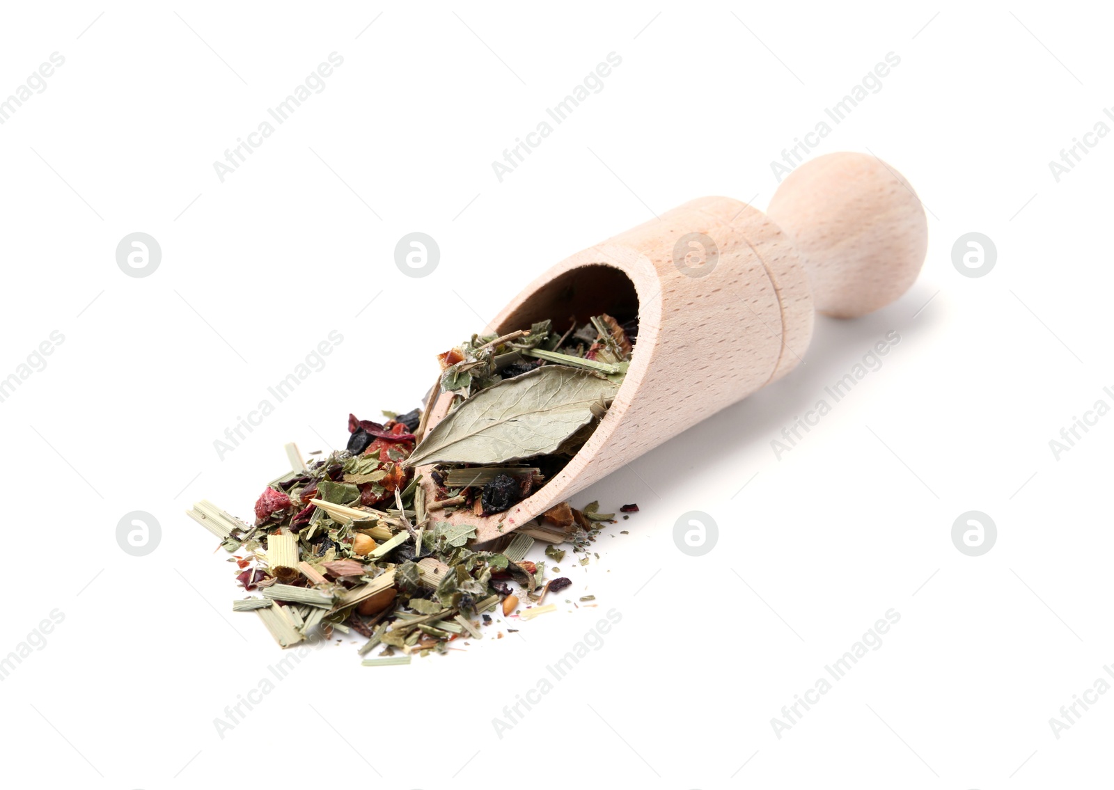 Photo of Dry herbal tea brew in scoop isolated on white