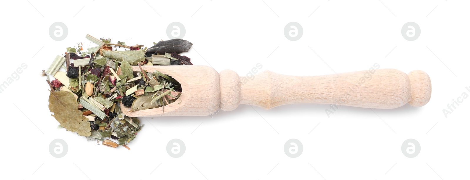 Photo of Dry herbal tea brew in scoop isolated on white, top view