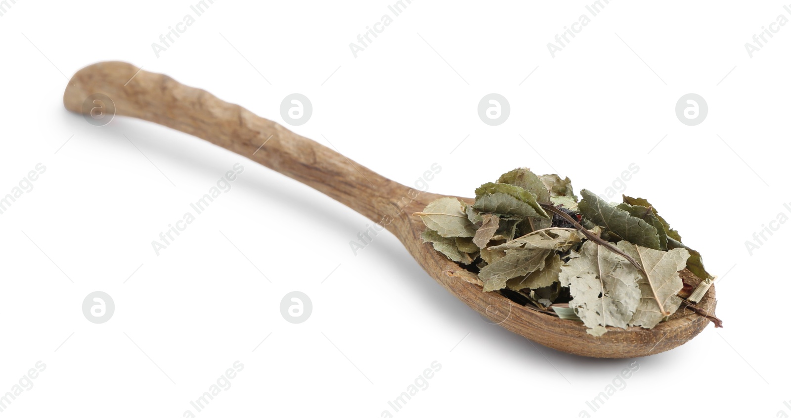 Photo of Dry herbal tea brew in spoon isolated on white