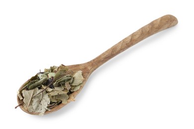 Photo of Dry herbal tea brew in spoon isolated on white