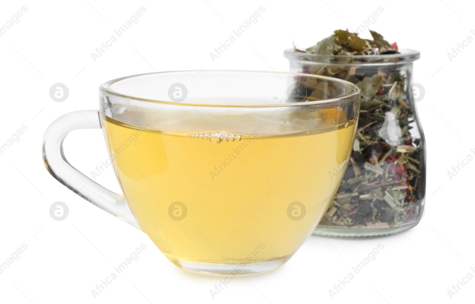 Photo of Delicious herbal tea and dry leaves isolated on white