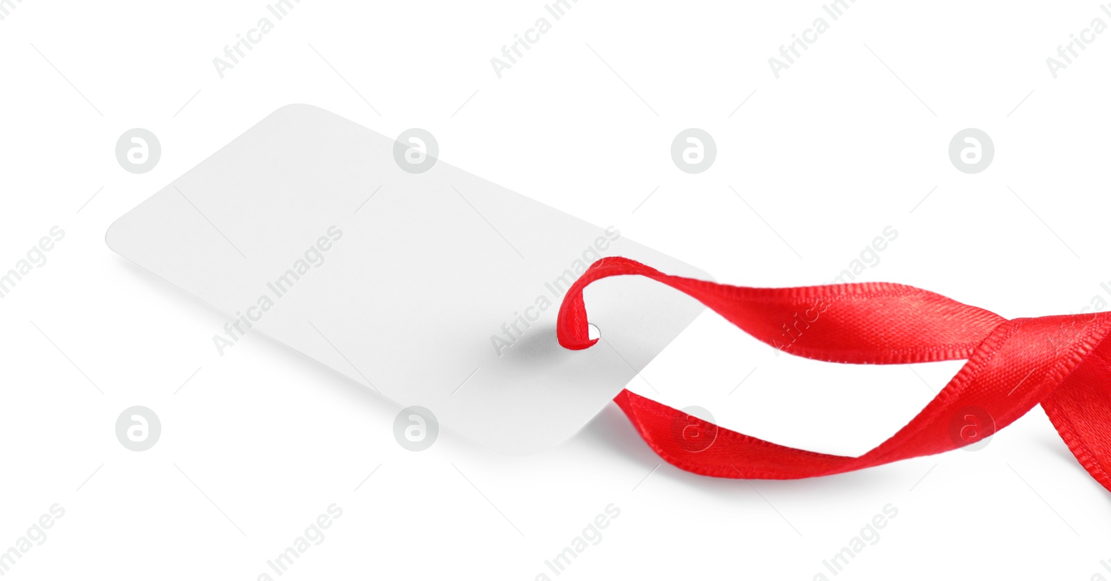 Photo of Blank tag with ribbon isolated on white