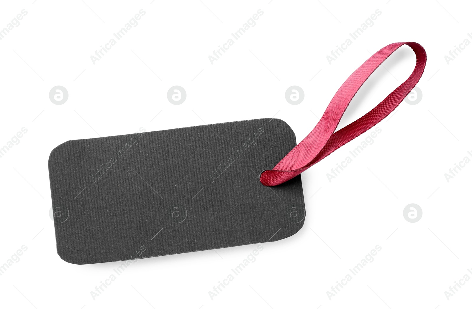 Photo of Blank tag with ribbon isolated on white, top view