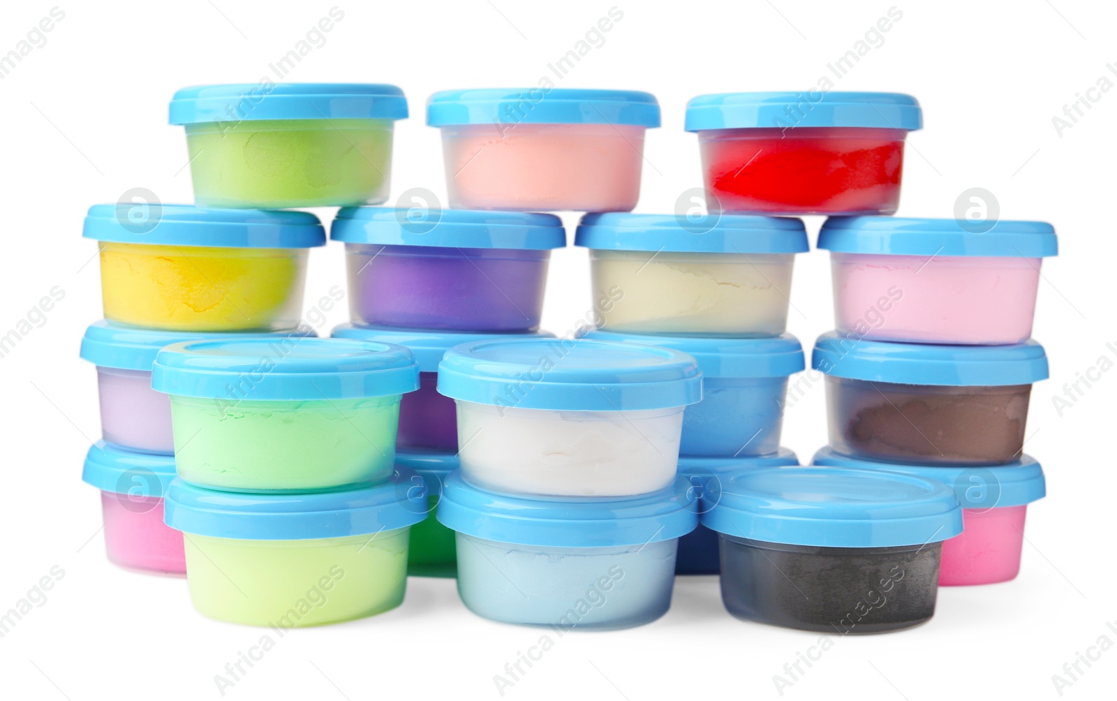 Photo of Different colorful modeling clay in plastic jars isolated on white