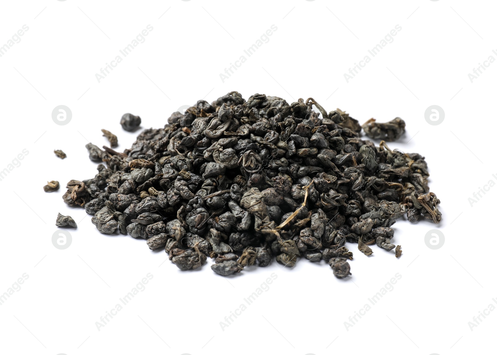 Photo of Pile of dry tea leaves isolated on white