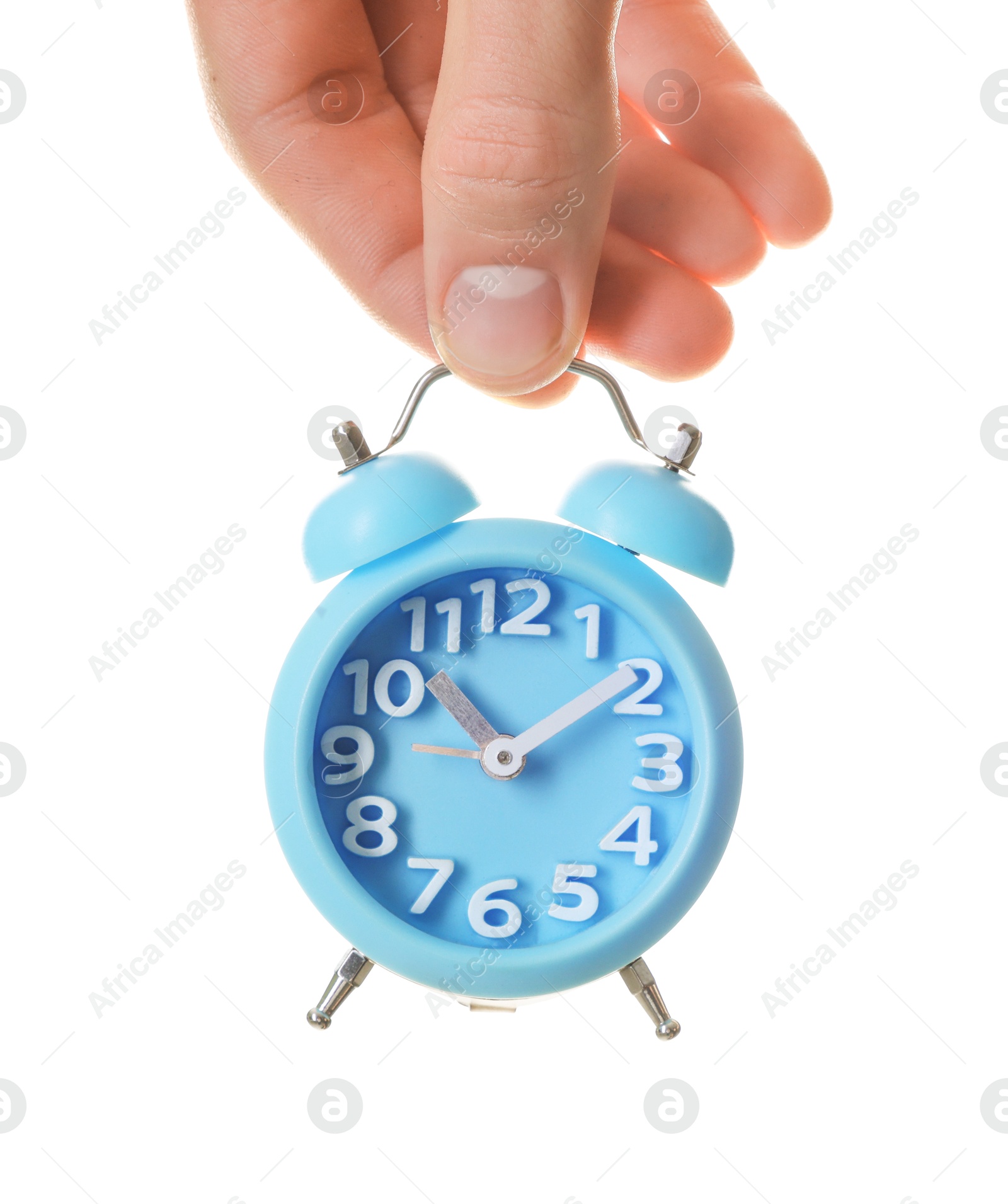 Photo of Man with light blue alarm clock on white background, closeup