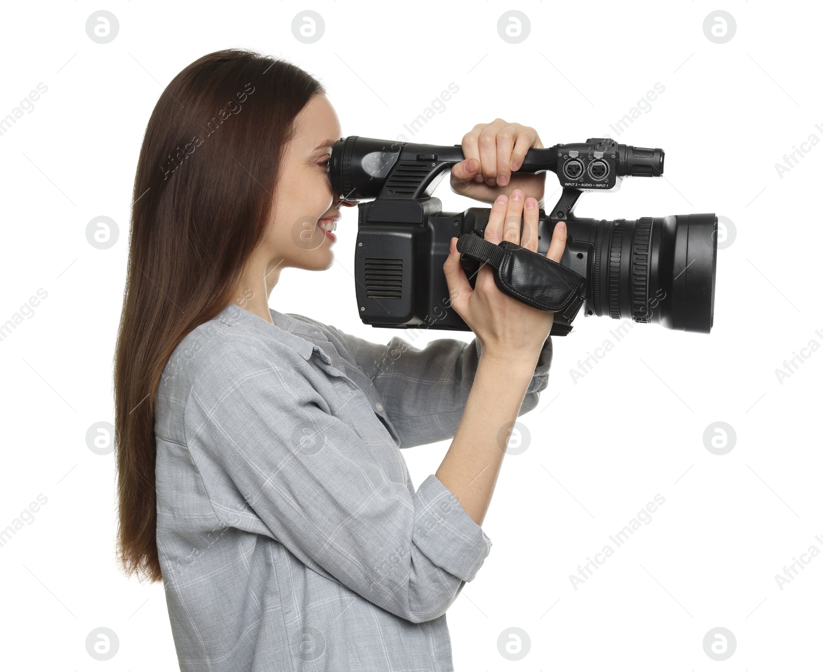 Photo of Happy woman with professional video camera on white background