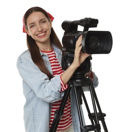 Photo of Happy woman with professional video camera on white background