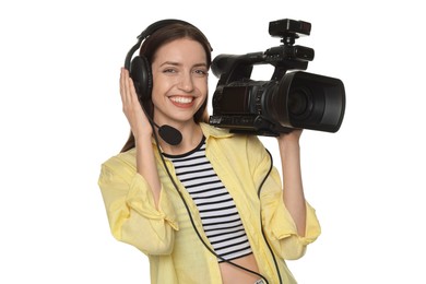 Photo of Happy woman with professional video camera and headset on white background