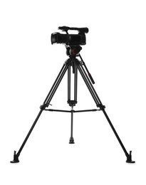 Photo of Modern video camera with tripod isolated on white