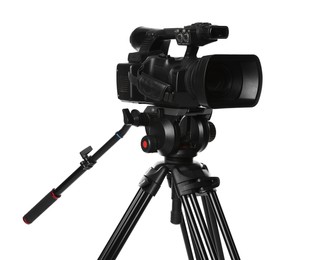 Photo of Modern video camera with tripod isolated on white