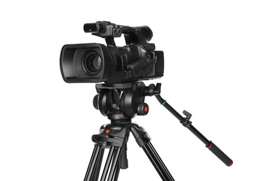 Photo of Modern video camera with tripod isolated on white