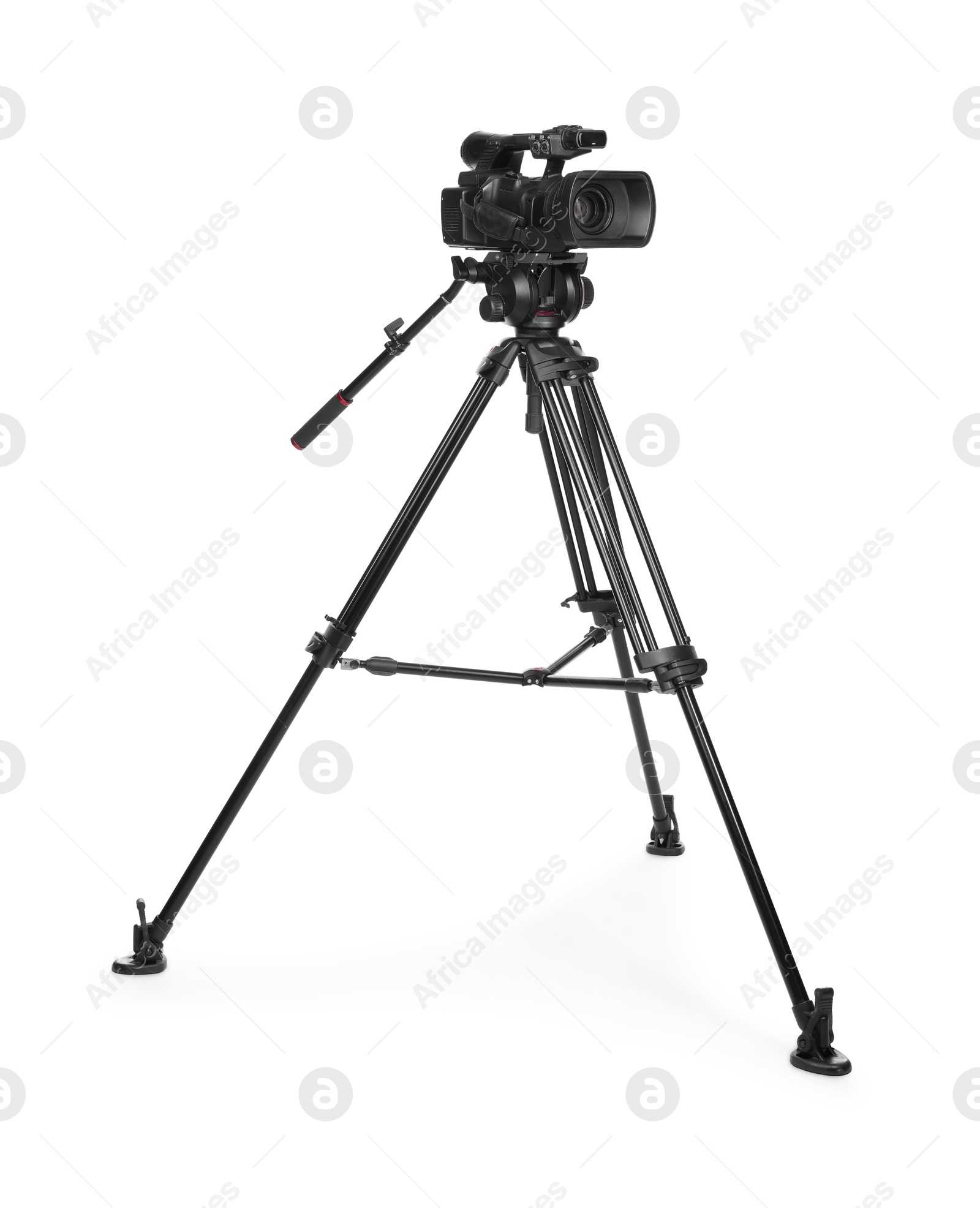 Photo of Modern video camera with tripod isolated on white