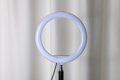 Photo of One ring lamp near light curtain. Photo and video equipment