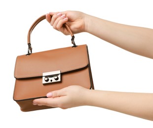 Photo of Woman with beautiful handbag on white background, closeup. Stylish accessory