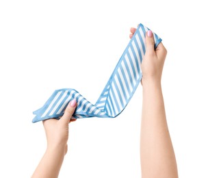 Photo of Woman with beautiful scarf on white background, closeup. Stylish accessory