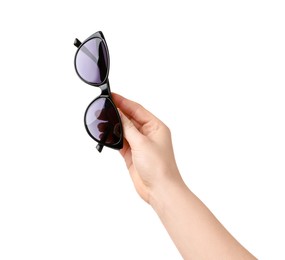 Photo of Woman with beautiful sunglasses on white background, closeup. Stylish accessory