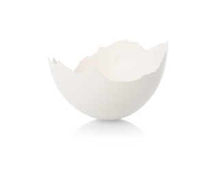 One piece of broken eggshell on mirror surface against white background