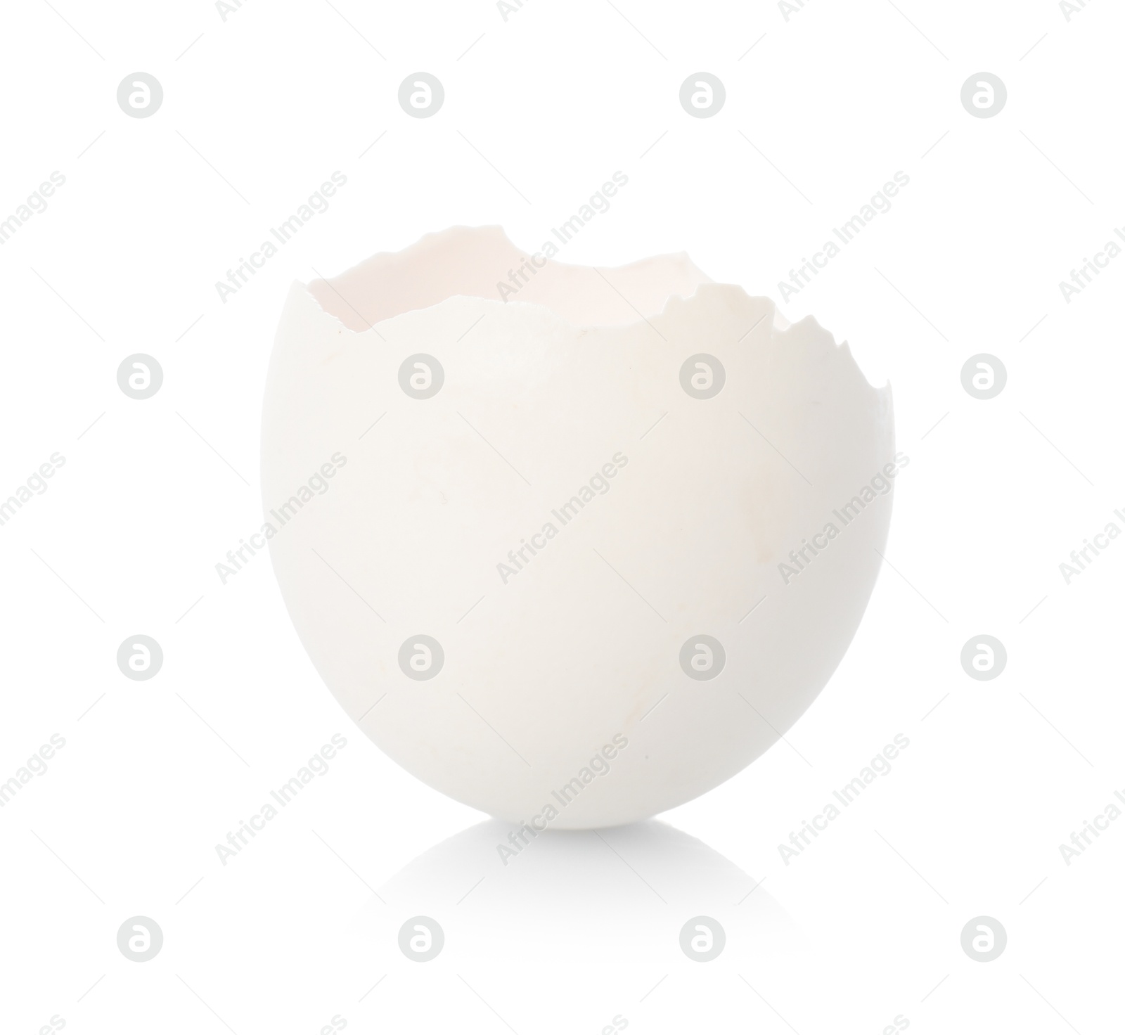 Photo of One piece of broken eggshell on mirror surface against white background