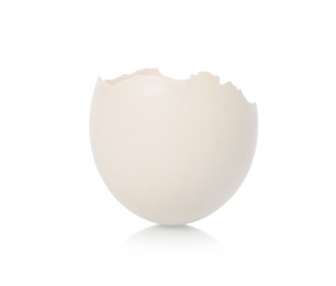 Photo of One piece of broken eggshell on mirror surface against white background