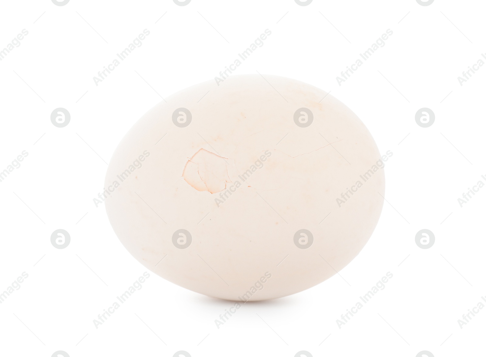 Photo of One egg with cracked shell isolated on white