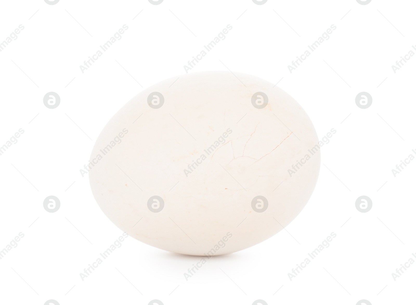 Photo of One egg with cracked shell isolated on white