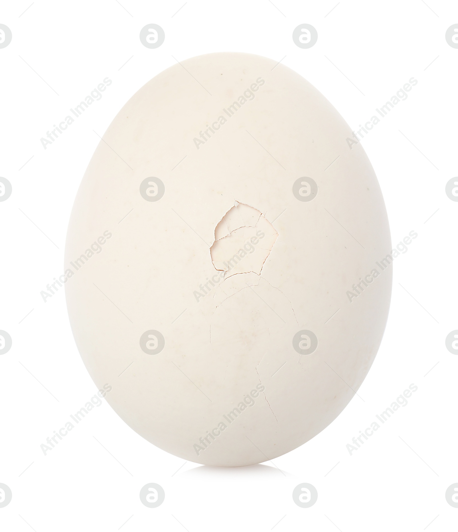 Photo of One egg with cracked shell isolated on white